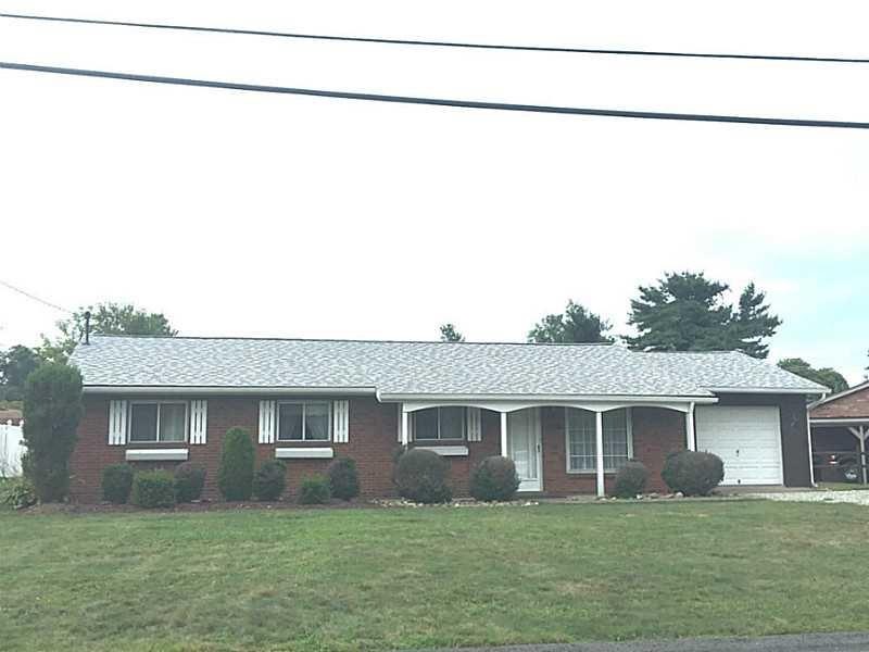 Exterior Front. LEVEL YARD