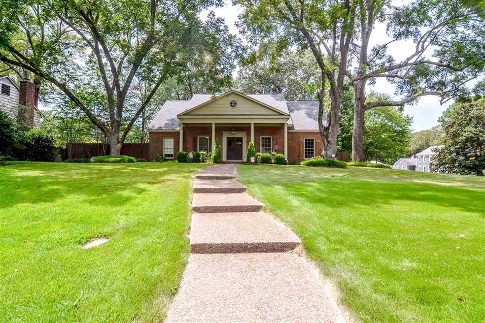 Lush landscaping & shade trees