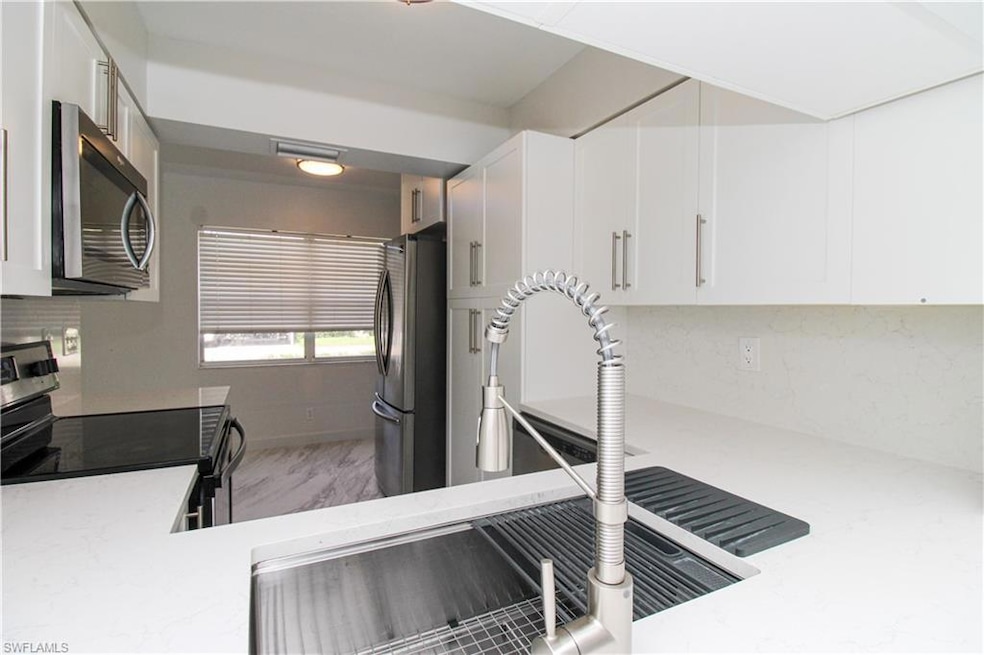 105 Wading Bird Cir unit 104, Naples, FL 34110 - photo 1