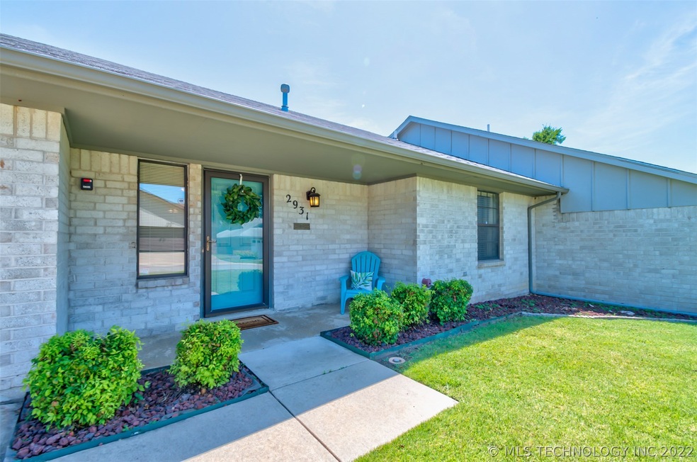 Low maintenance landscaping and covered front porch.
