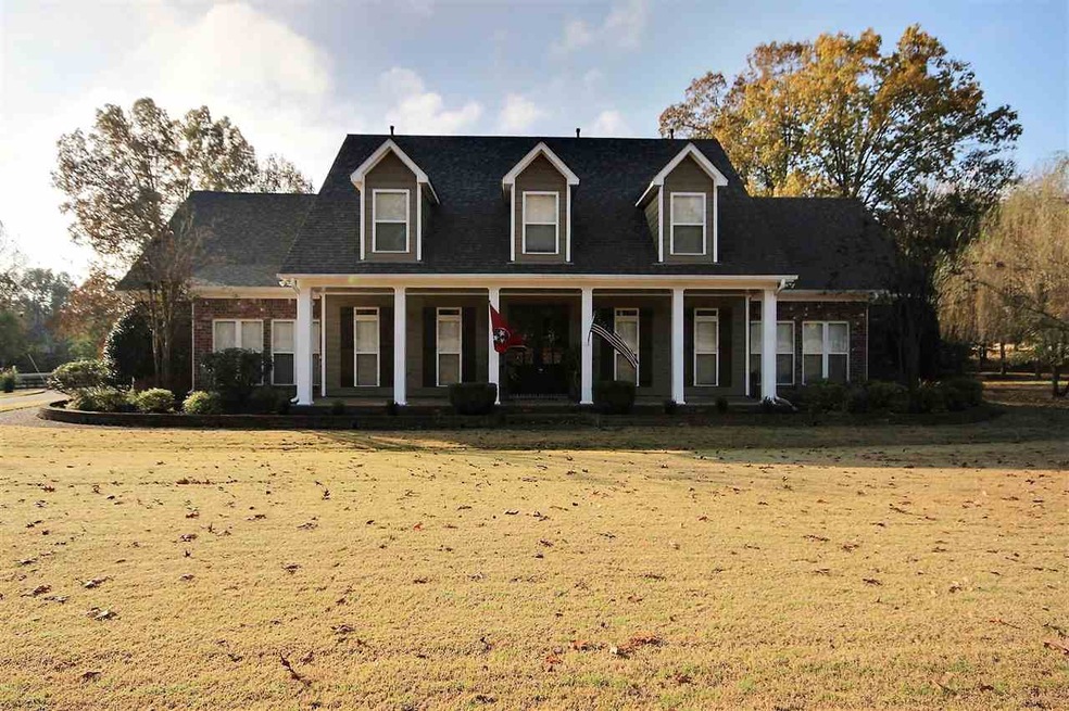 Beautiful brick with long front porch. 