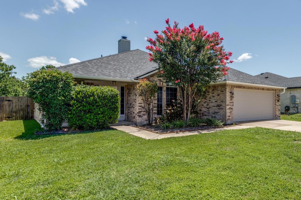 View of front of property featuring brick siding,