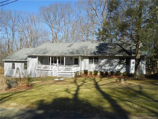 Front of house with covered porch, newer roof and 