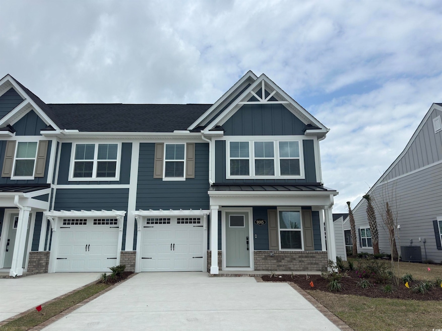 View of front of property with central AC unit, a 
