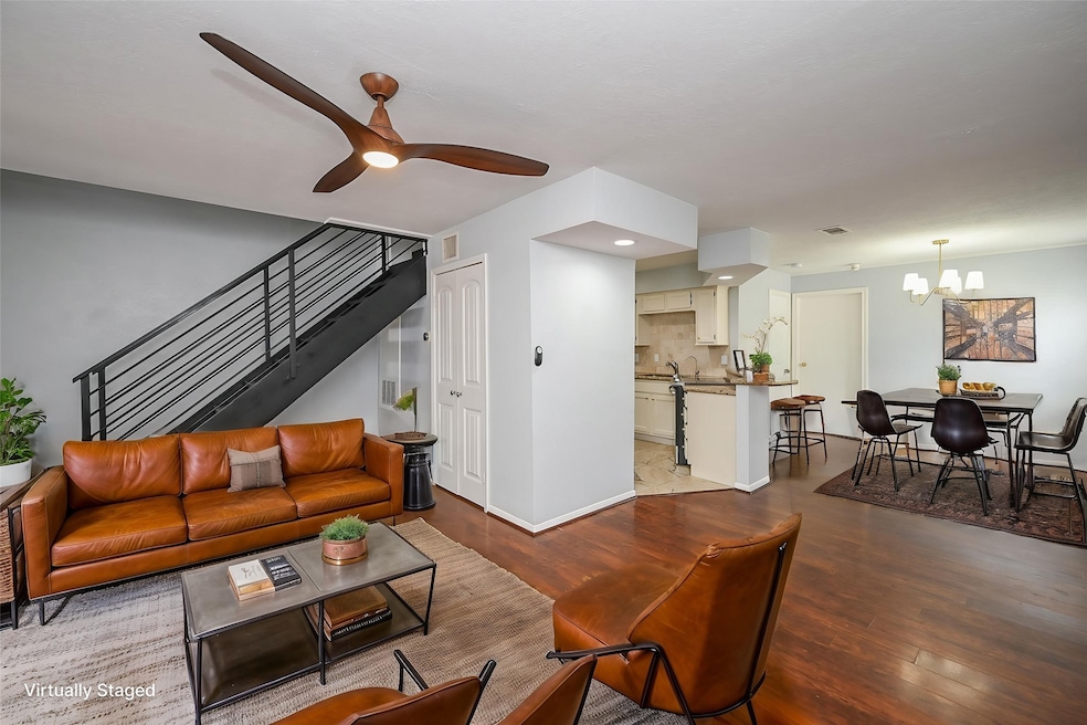 Stylish, open-concept family room with modern desi