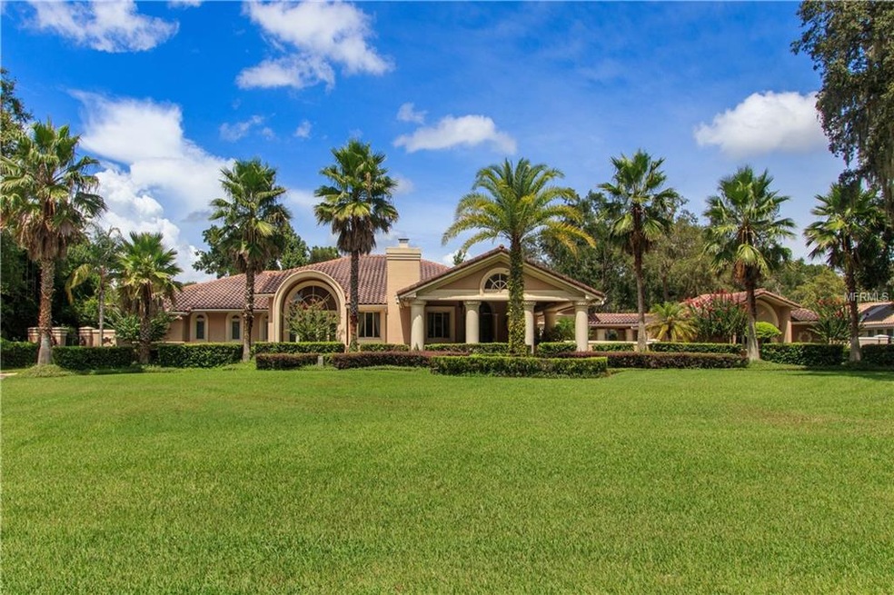 Custom estate with tile roof on 1.13 acres