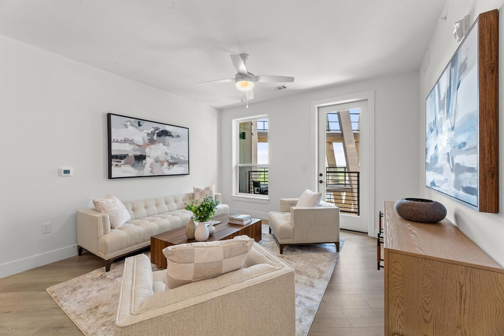 Living room featuring light wood finished floors,