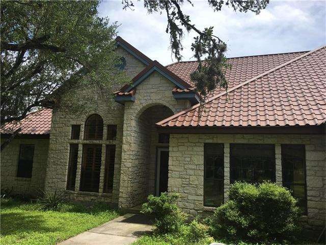 Beautiful stone home with metal roof
