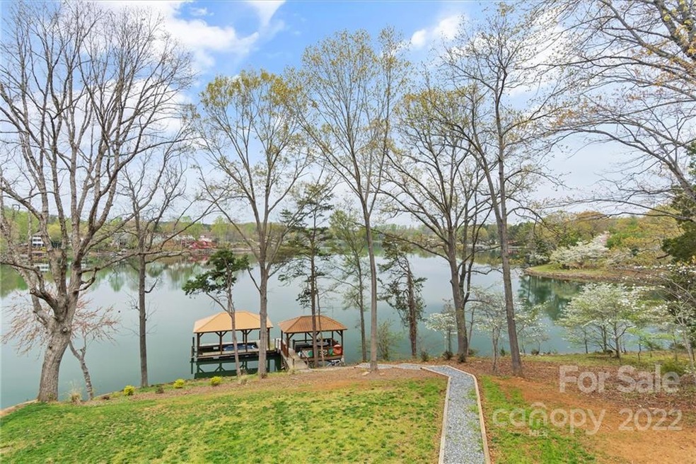 Just wait until you walk into this stunning Lake Norman showpiece home and see the views from every window!