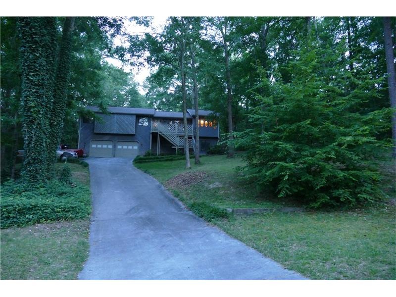 Long driveway leading to this beautiful home seati