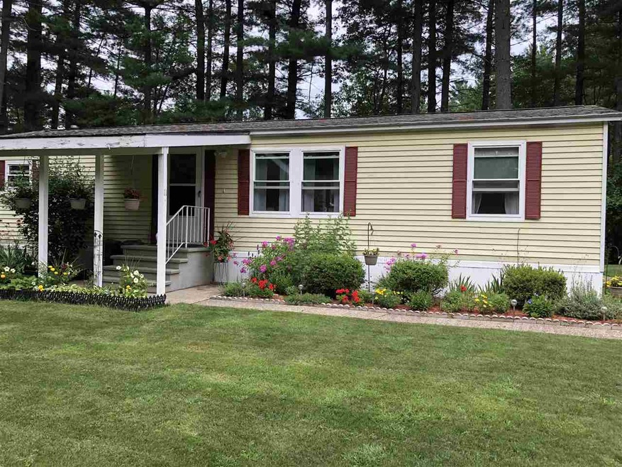 Beautifully landscaped front yard on cul de sac