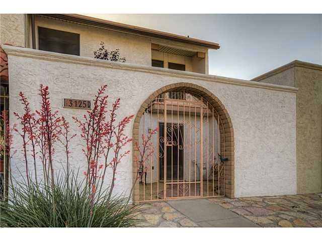 Exterior Front. Courtyard entry