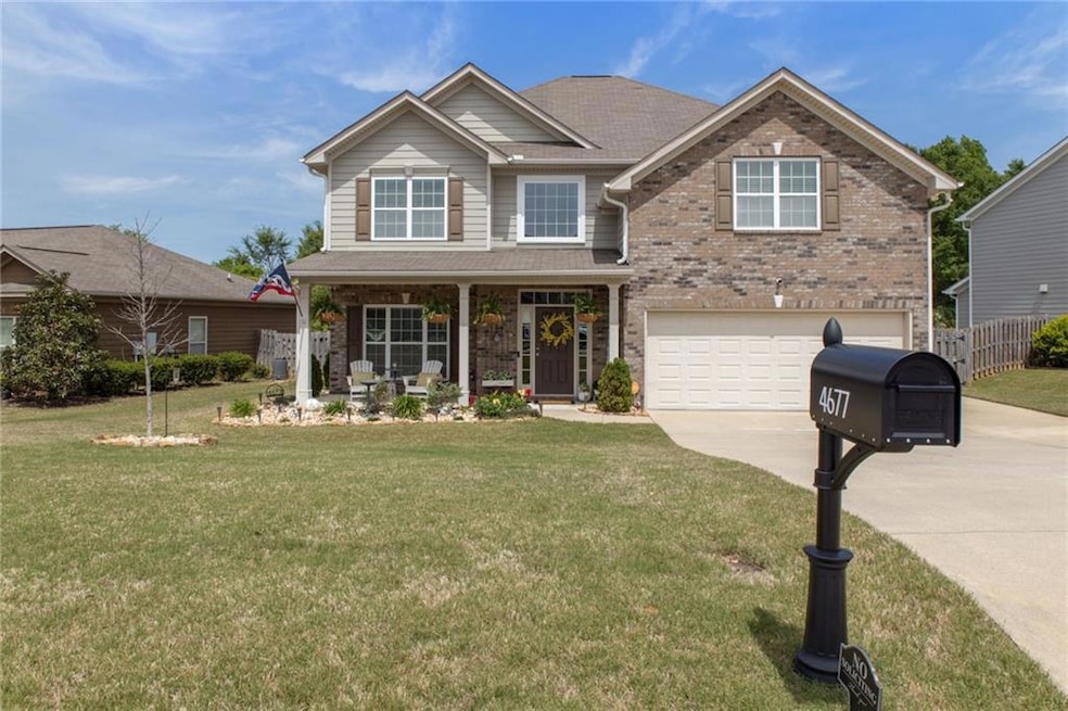View of front of house featuring a garage, a front