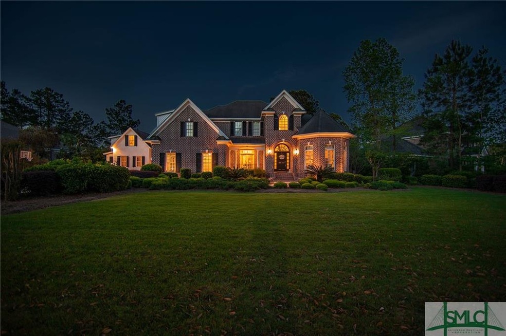 All brick home on the 10th green of Savannah Quart