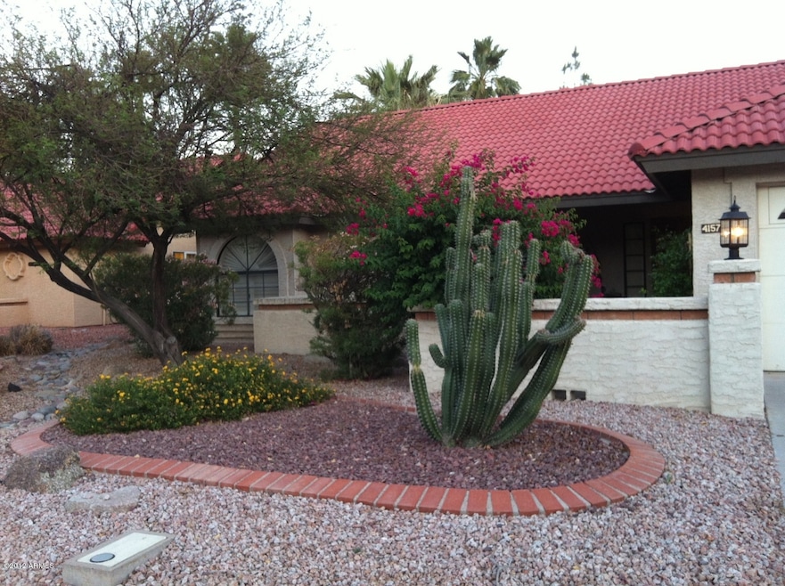 Front is professionally landscaped