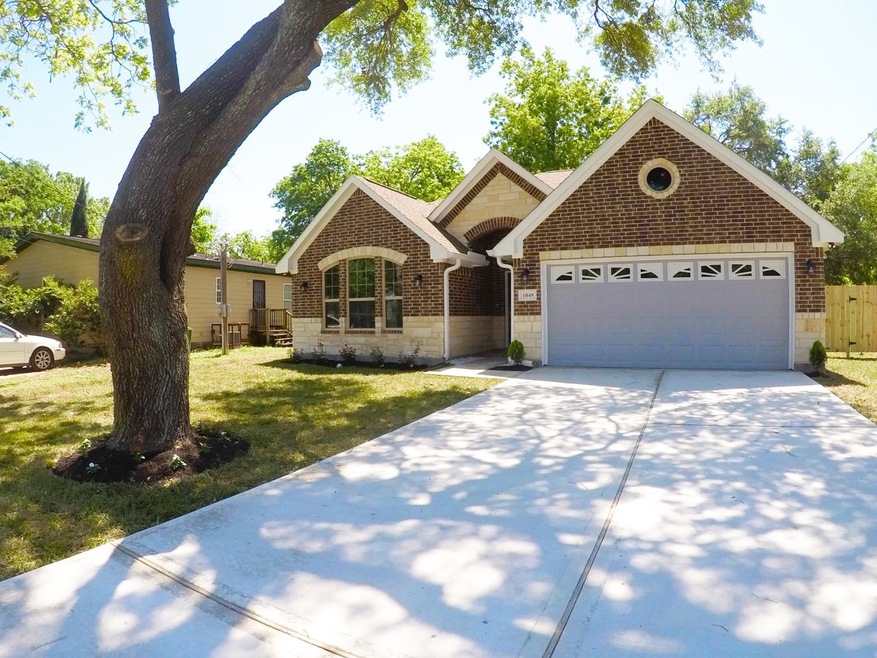 1049 Reverend b j Lewis Dr, Houston, TX 77088 - photo 1