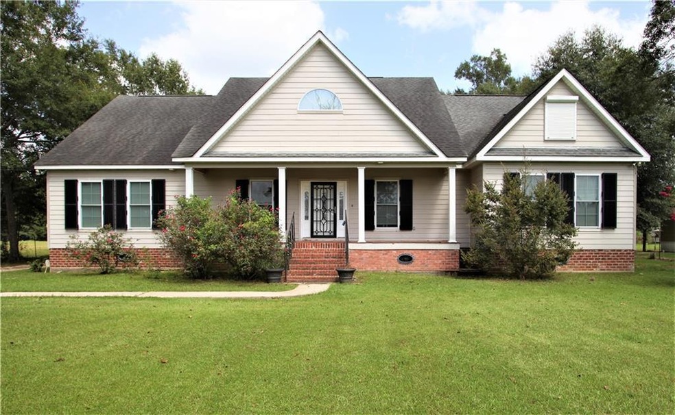Custom built one owner Acadian style home on over