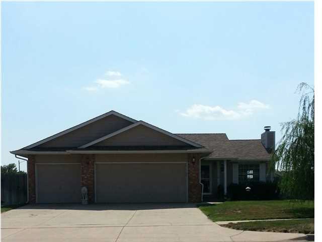 Front with 3 car garage.