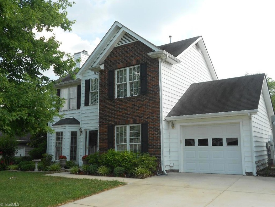 Beautifully landscaped yard with tons of curb appeal.
