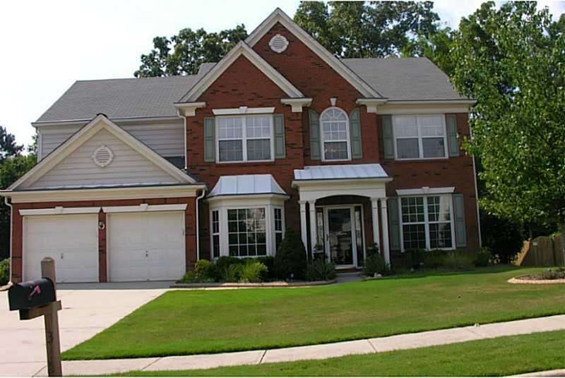 Exterior Front. Full Brick Front with Covered Fron