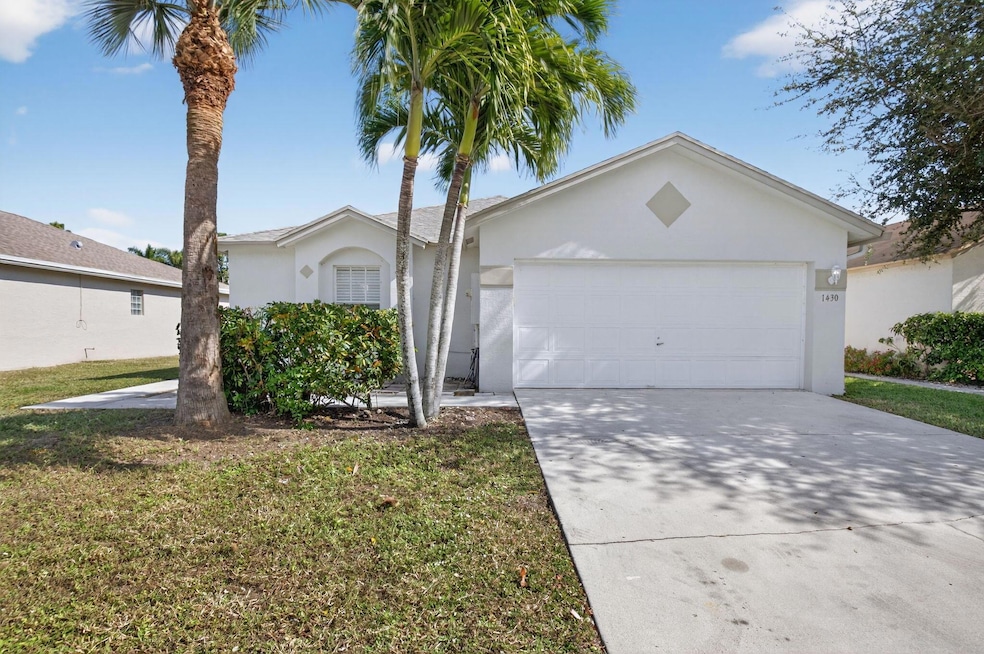 1430 Red Apple Ln, West Palm Beach, FL 33415 - photo 1