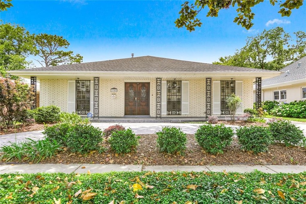 Attractive one-level brick home on Lake side of W