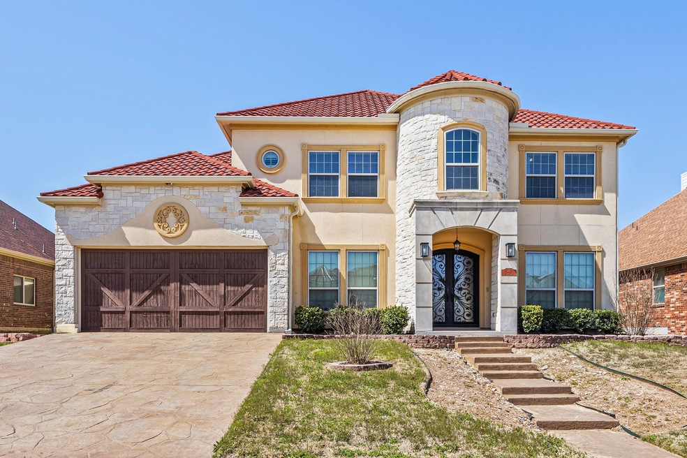 A commanding presence from the curb, this home’s s