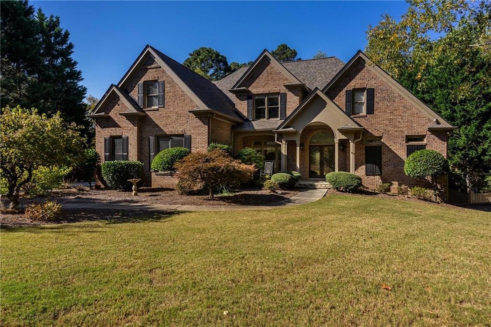 Craftsman inspired home with a front yard