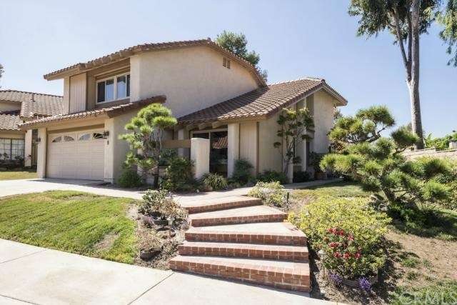 Gorgeous curb appeal with tiled roof, beautiful la