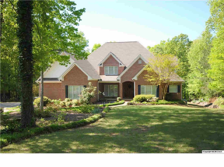 Enjoy Luxury Living in this executive 4bd/6ba home located on 1.6 acres in Hickory Heights Sub. two family living areas, large dining room, study, large deck, central vac sys and 1400 of storage! Hartselle City Schools
