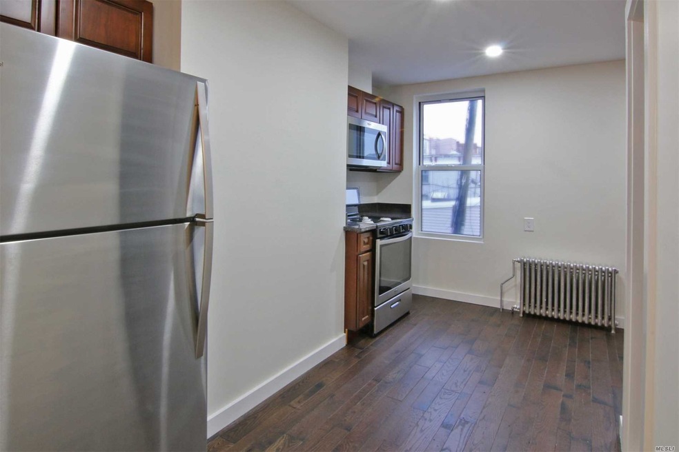 56-10 61st St unit 2L, Flushing, NY 11378 - photo 1