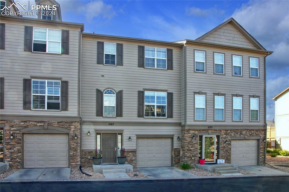 Multi unit property featuring a garage