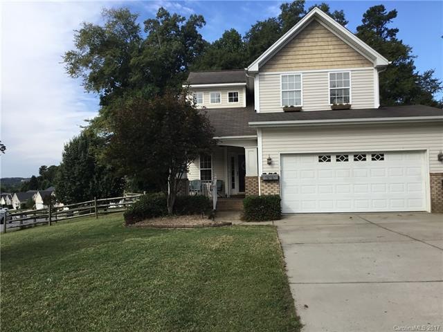 FRONT EXTERIOR - FENCED YARD