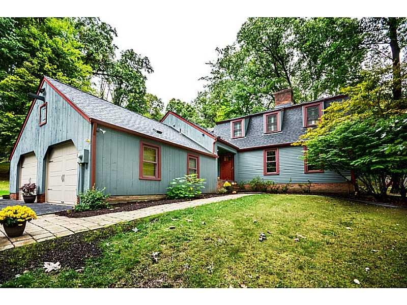Exterior Front. Pristine home nestled on a private