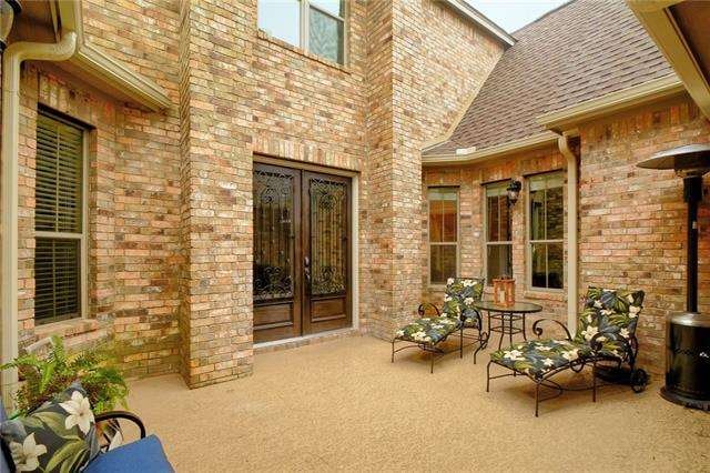 Stunning 8 ft double wood door with wrought iron d