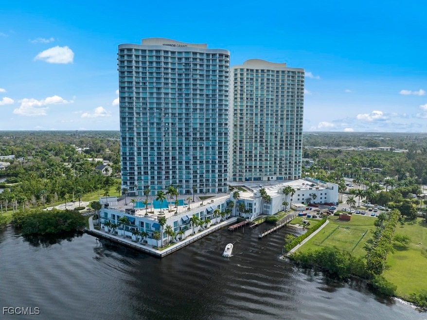 Aerial view of a nearby body of water and apartment complex