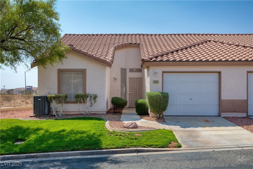 Mediterranean / spanish-style house with a tiled r