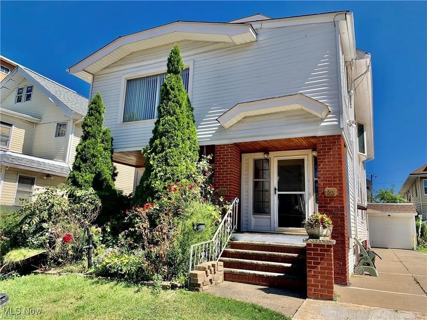 View of front of the house with the garage