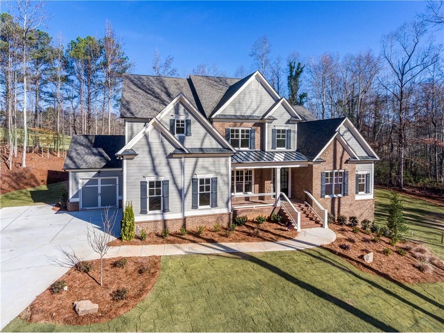 BOASTING 1.95 ACRES IN MILTON!  GATED COMMUNITY WI