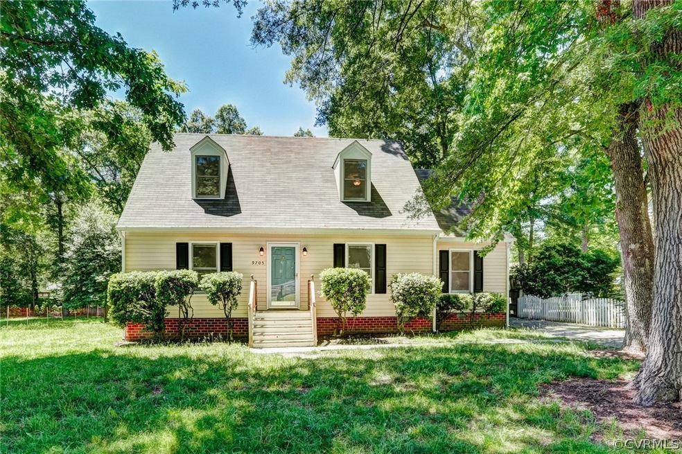 Charming Cape Cod freshly painted throughout, with