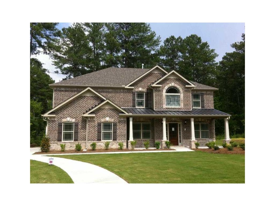 Exterior Front. 3 sided brick with large Front Por