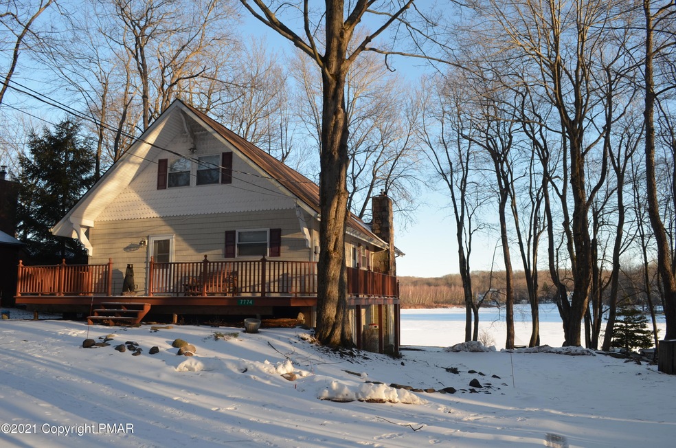 7774 Lake Shore Dr, Pocono Lake, PA 18347 - photo 1