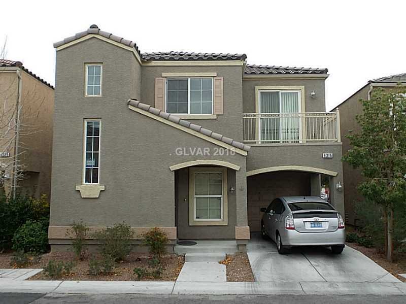 Property Photo. Exterior Front View with Grown Lan