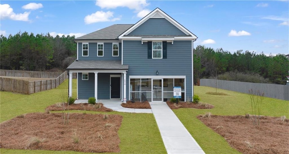 View of front of home featuring a front lawn