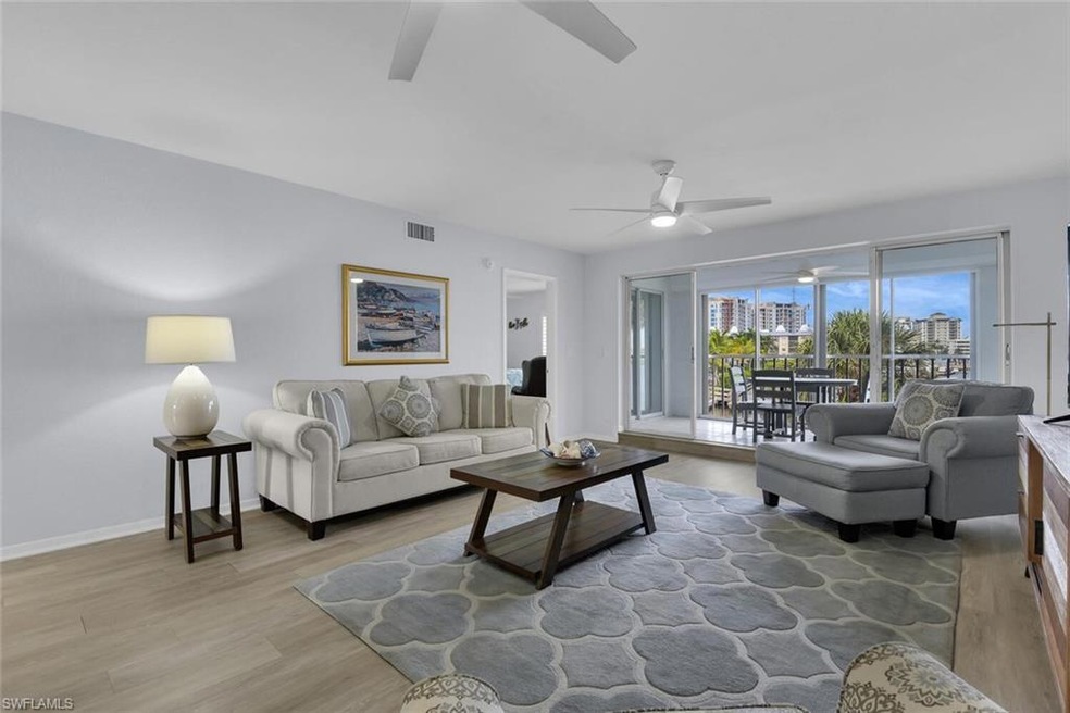 9101 Vanderbilt Dr unit 203, Naples, FL 34108 - photo 1