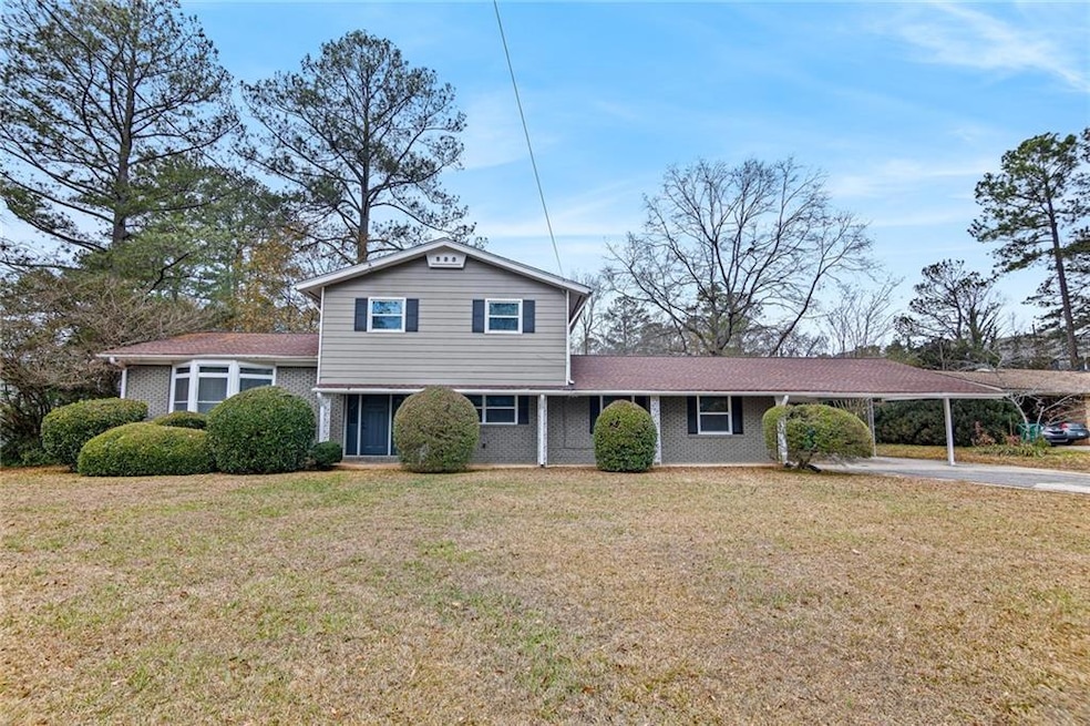 View of front facade featuring a carport and a fro