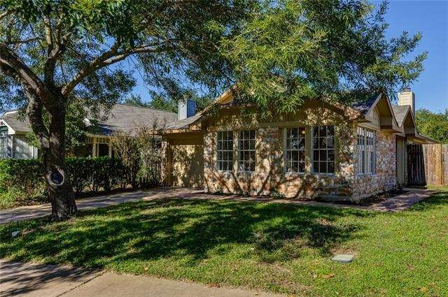 Great curb appeal with a beautiful mature shade tr