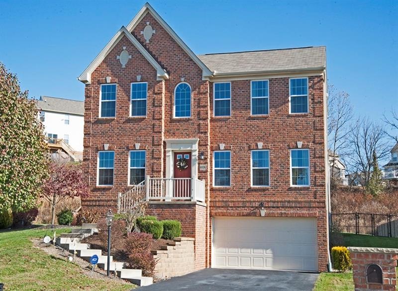 Better than new! Warm & inviting! Situated on a ni