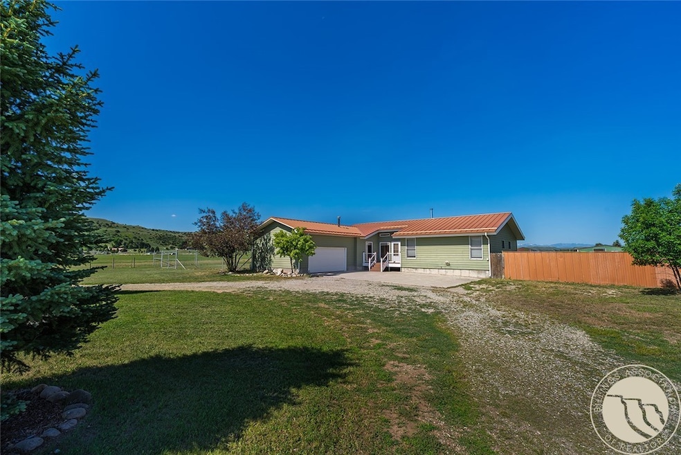 Circular drive with access to front porch and gara