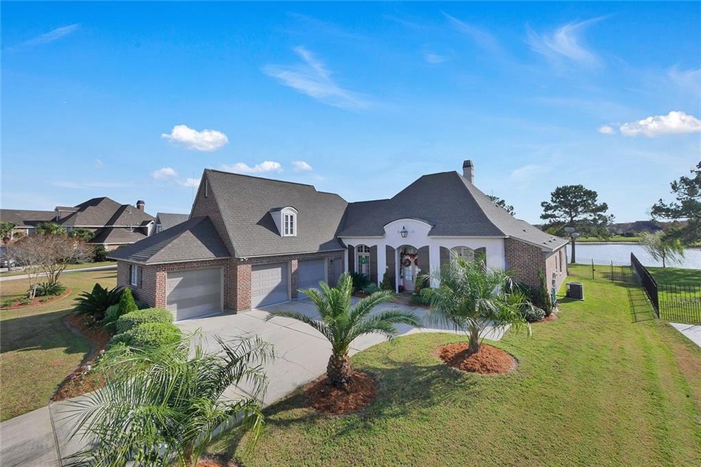 Beautifully landscaped home over looking the lake